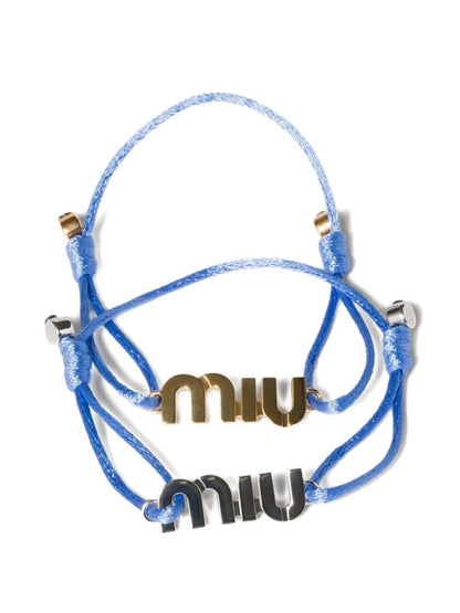 Miu Miu cord and metal bracelets