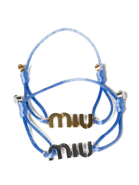 Miu Miu cord and metal bracelets